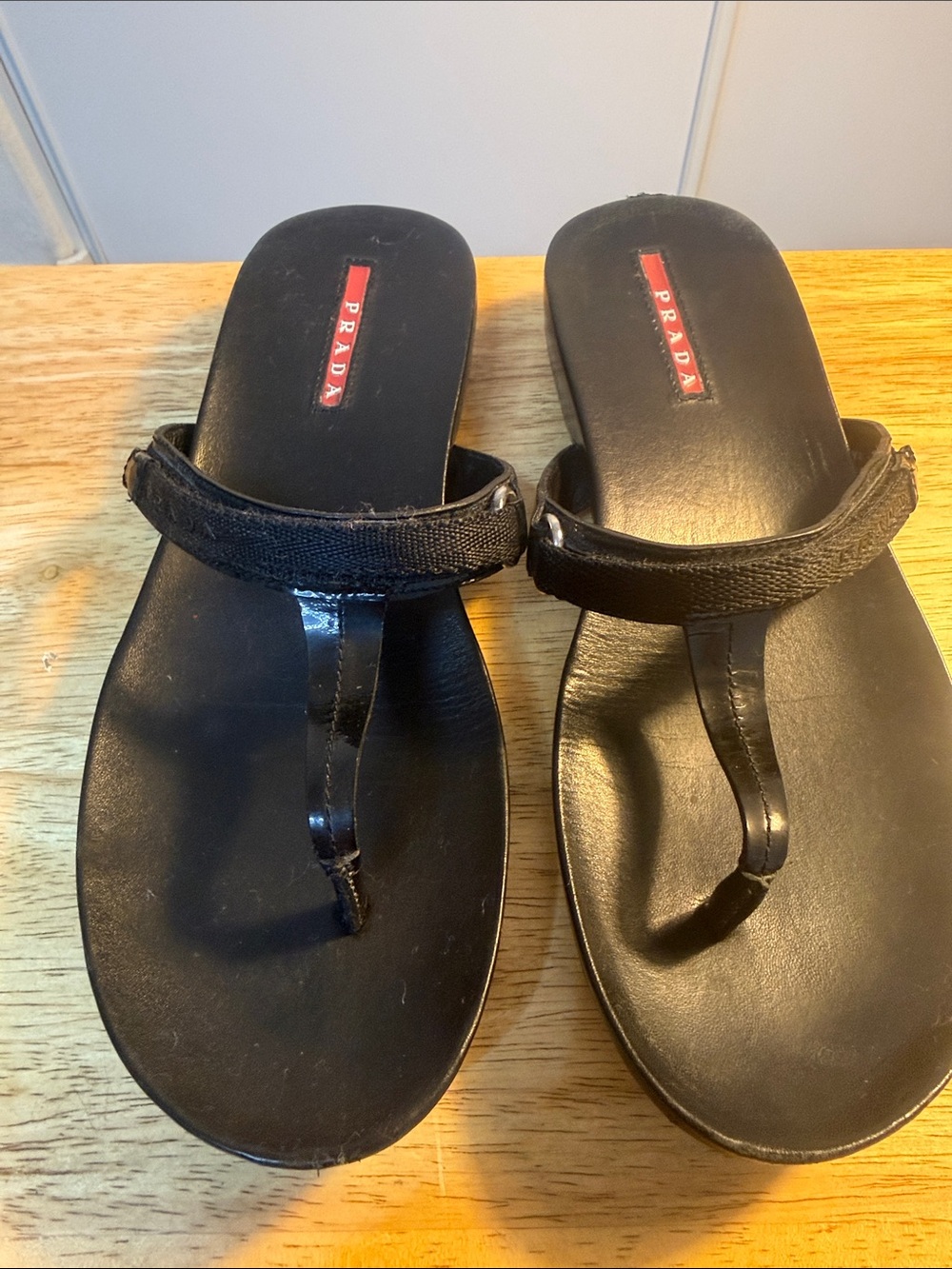 Prada Black Leather Thong Sandals with Red Logo Inset - Picture 2 of 6